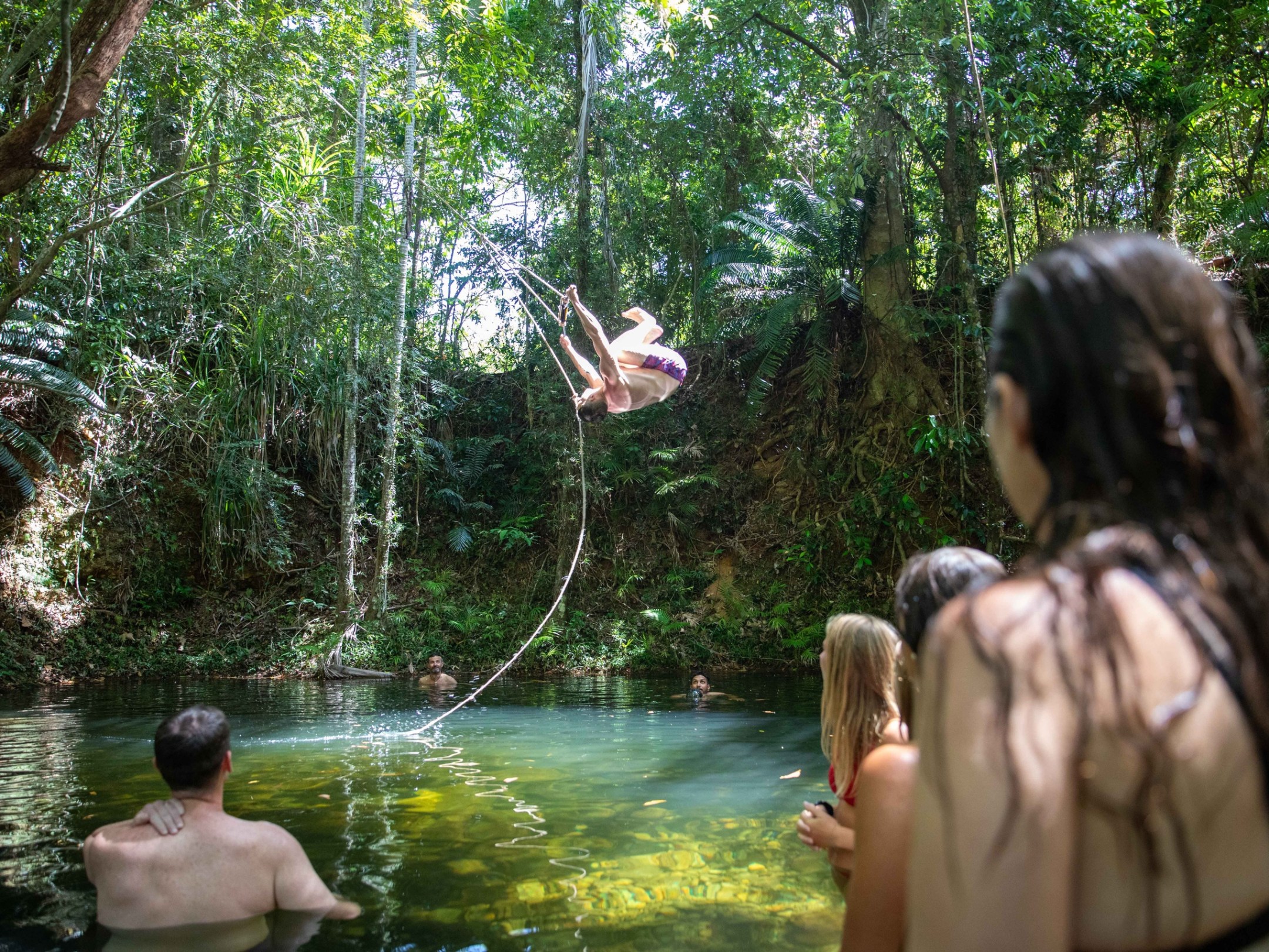Swimming in crystal-clear crater lake