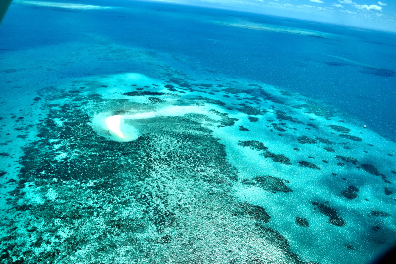 Aerial view of coral formations on the outer Great Barrier Reef off Cairns