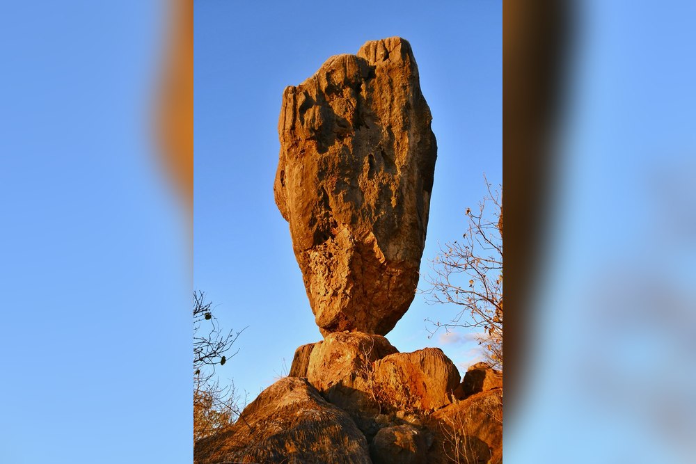 Balancing Rock at Chillagoe, a limestone tower resting on a smaller boulder