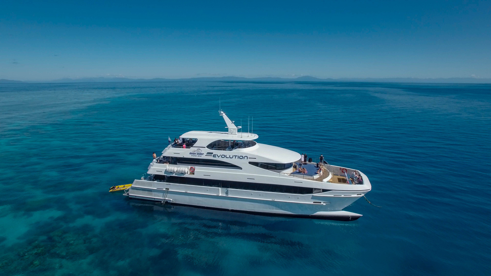 Snorkellers near superyacht