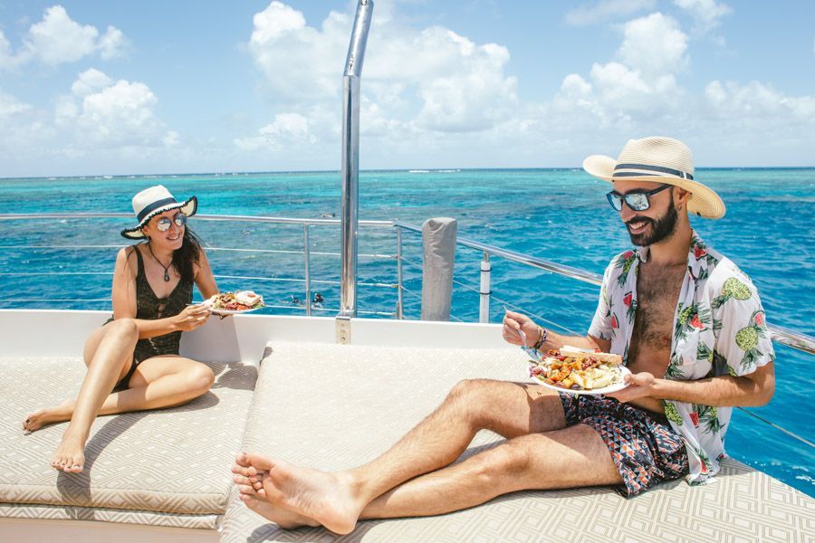 Couple dining on deck