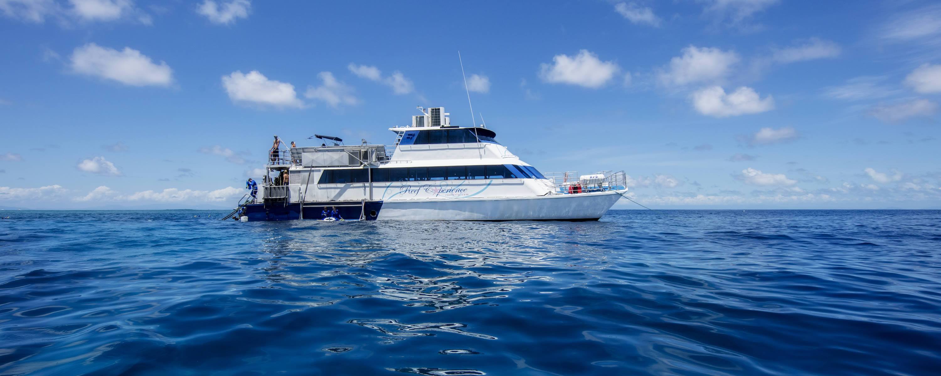 Vessel anchored at reef, side view