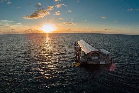 Pontoon vessel at golden hour